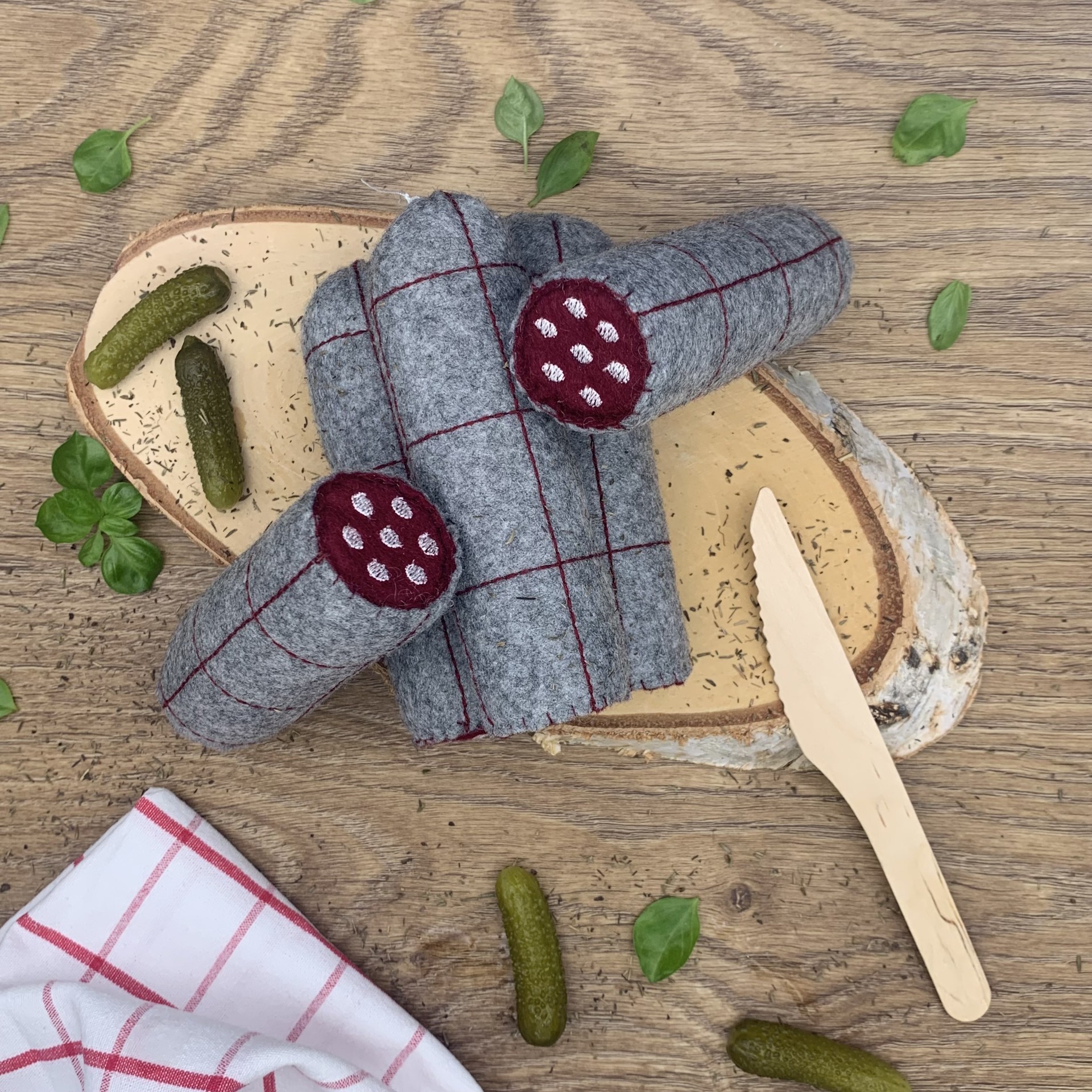 Saucissons en feutrine faits main pour jouer à la dînette, pour les enfants à partir de 18 mois.